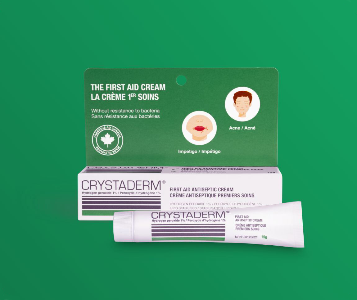 Boîte et tube de crème antiseptique de premiers soins Crystaderm